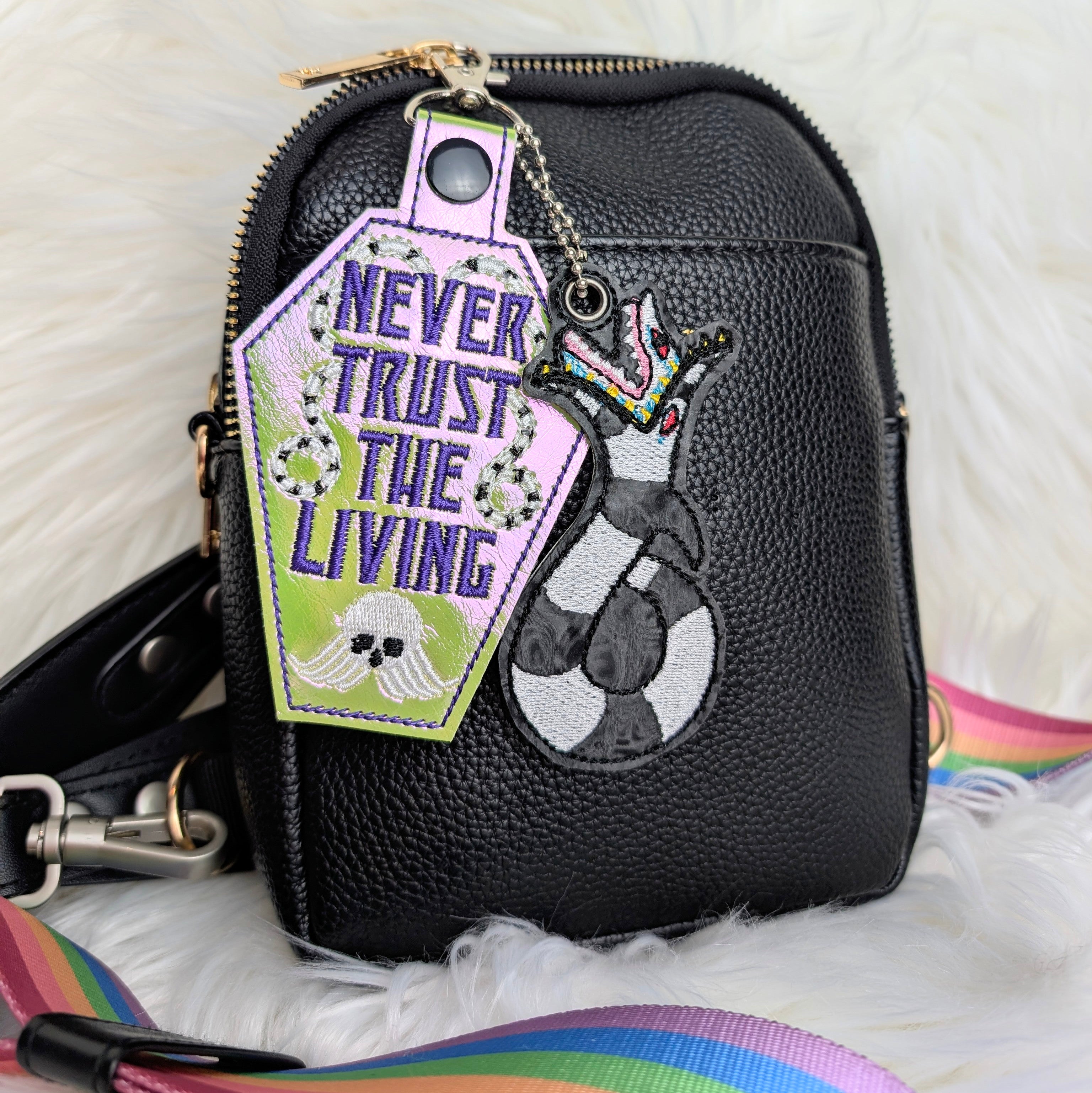 “Never Trust the Living” Coffin Snap Tab Keychain